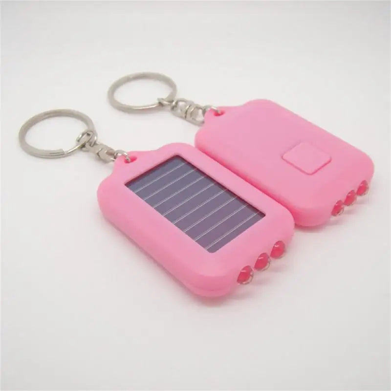 Solar-Powered LED Flashlight Keychain – Portable Emergency Light for Camping & Survival