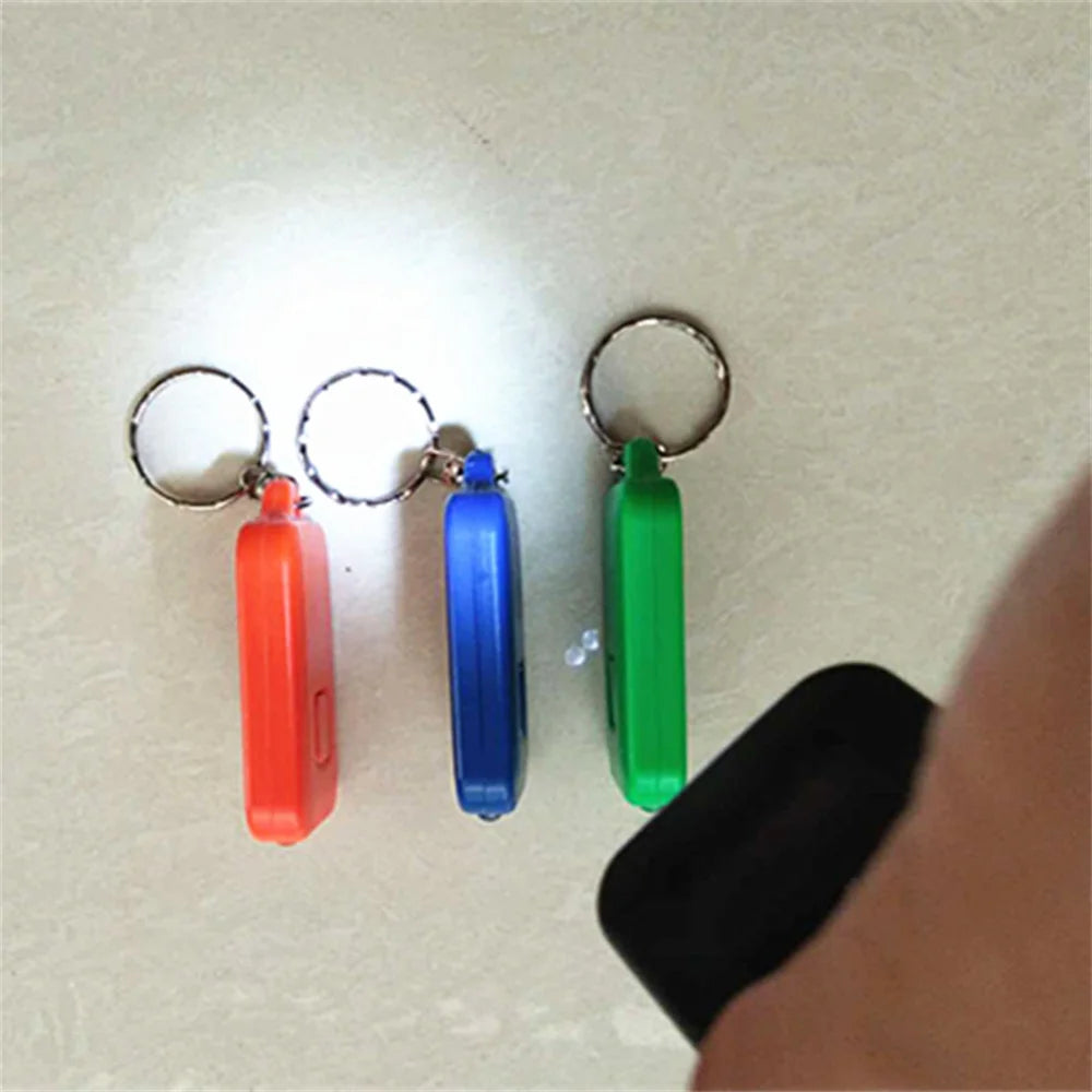 Solar-Powered LED Flashlight Keychain – Portable Emergency Light for Camping & Survival