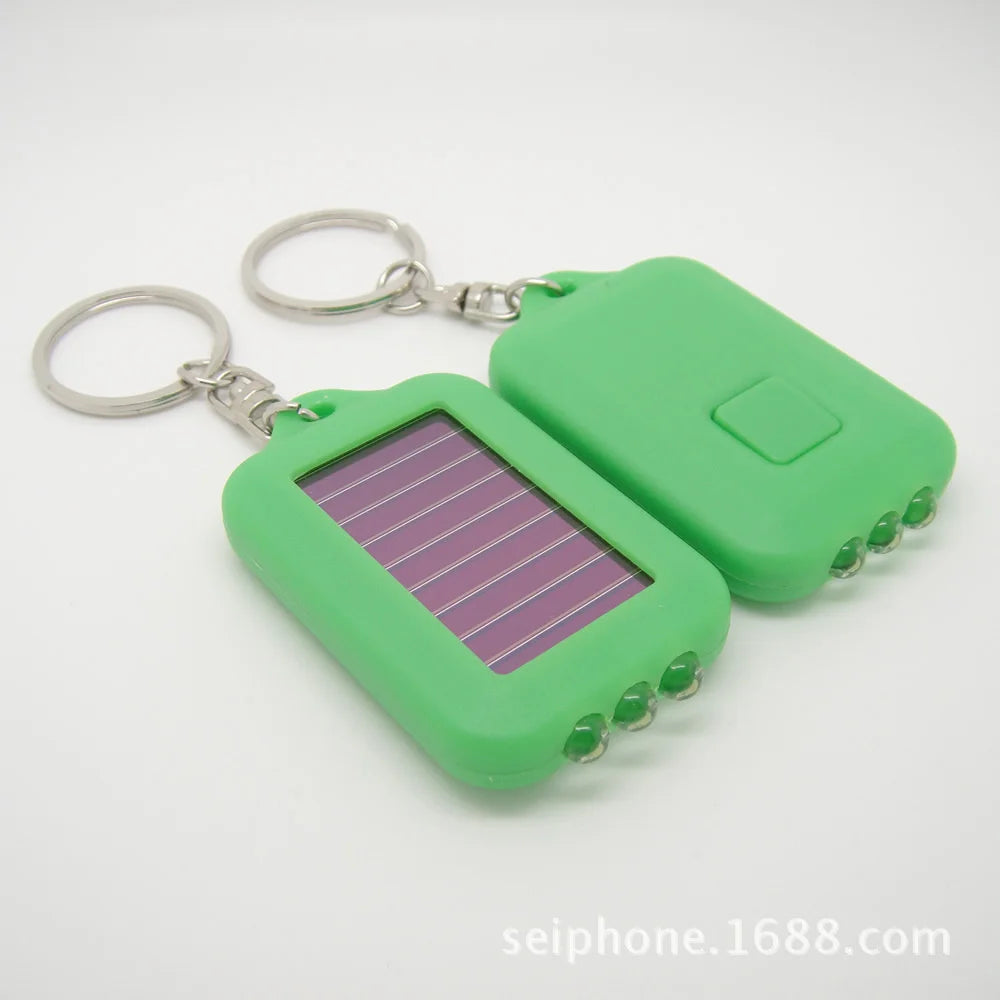 Solar-Powered LED Flashlight Keychain – Portable Emergency Light for Camping & Survival