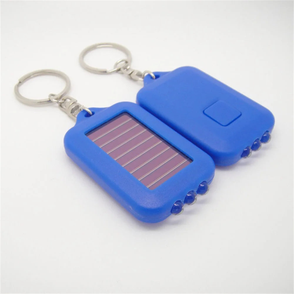 Solar-Powered LED Flashlight Keychain – Portable Emergency Light for Camping & Survival