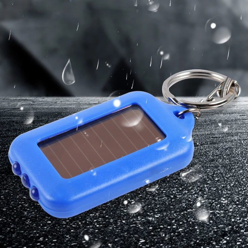 Solar-Powered LED Flashlight Keychain – Portable Emergency Light for Camping & Survival