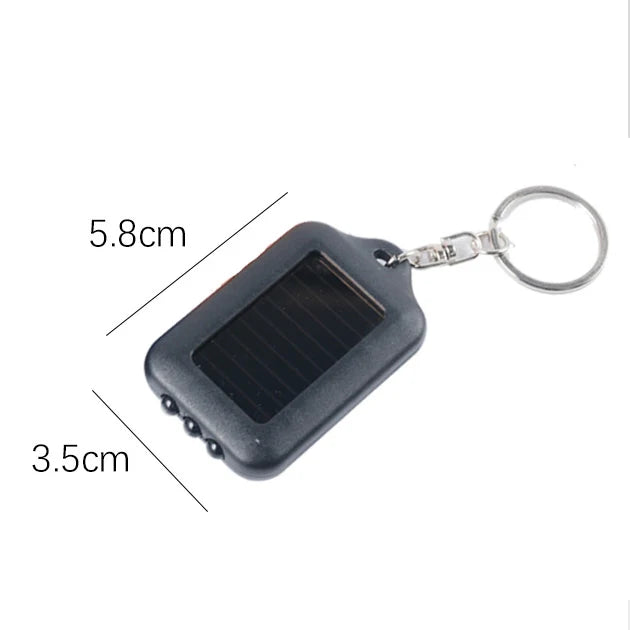 Solar-Powered LED Flashlight Keychain – Portable Emergency Light for Camping & Survival